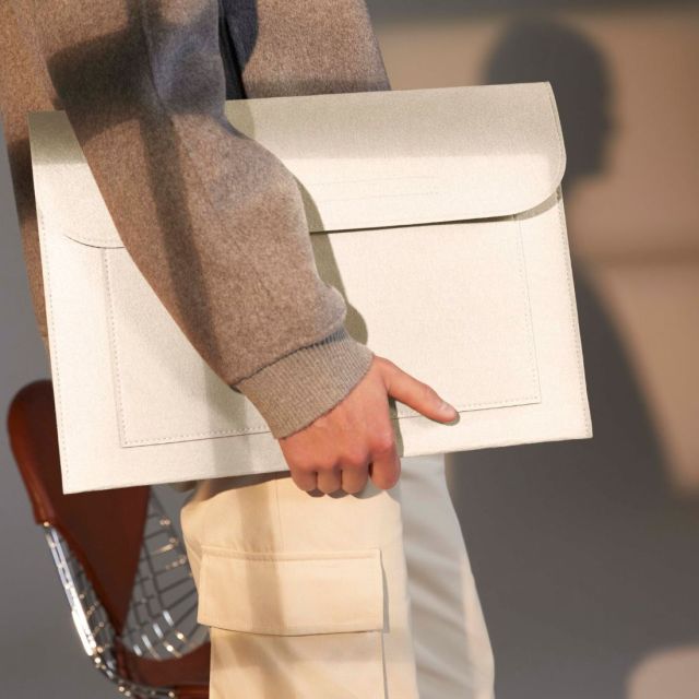 Bagbase Felt Laptop/Document Slip in Soft White being held
