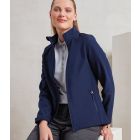 Model wearing Premier Ladies Windchecker Recycled Printable Soft Shell Jacket