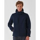 Model wearing B&C Mens Hooded 3-Layer Softshell