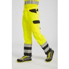 Model wearing Portwest  PW2 Hi Vis Service Trousers