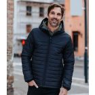 Model wearing Stormtech Mens Nautilus Quilted Hooded Jacket