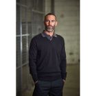 Model wearing Pro RTX Pro Acrylic V Neck Sweater