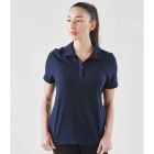 Model wearing Stormtech Womens Pure Earth Camino Performance Short Sleeve Polo
