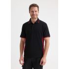 Model wearing Uneek Two Tone Polo Shirt