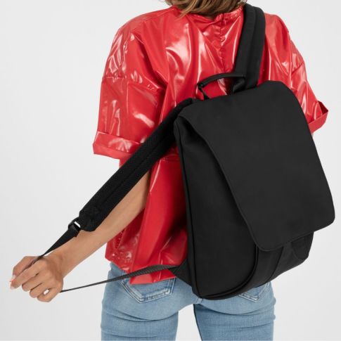 Shugon Amber Chic Laptop Backpack in Black on a persons shoulders