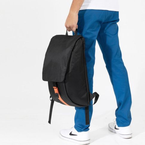 Shugon Amethyst Stylish Computer Backpack in Black being held by the top handle