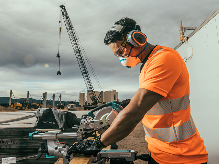 Workers wearing Portwest DX4 high-visibility tops