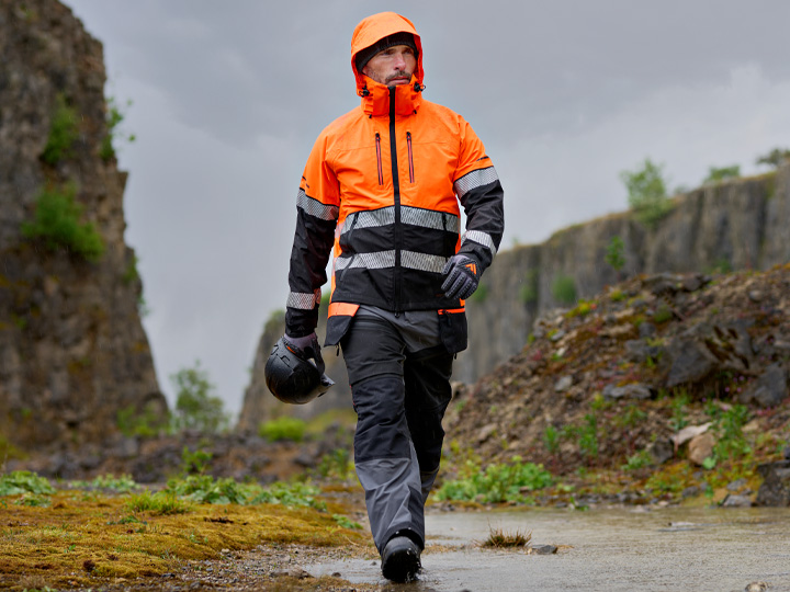 Worker wearing Portwest EV4 high-visibility clothing