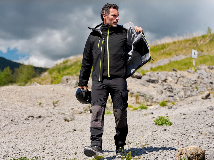 Model wearing Portwest EV4 workwear