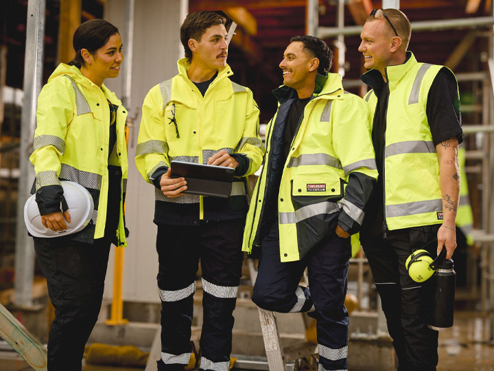 Workers wearing Portwest high-visibility clothing
