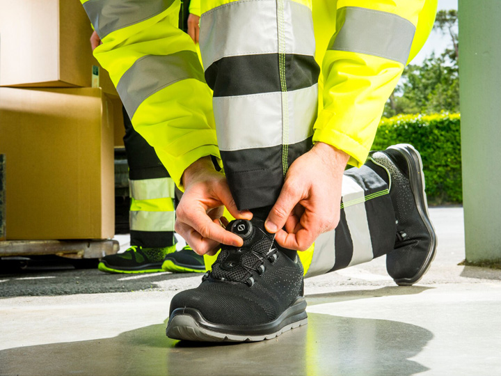 Portwest safety footwear being worn at work