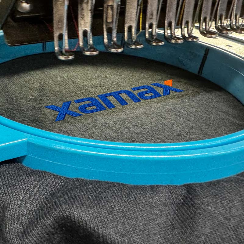 Logo embroidered workwear supplied by XAMAX