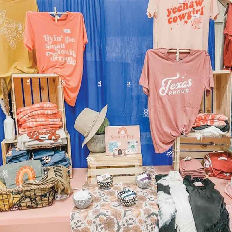 Trade stand example of custom t-shirts.